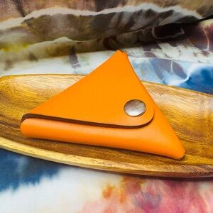 Triangular leather coin pouch orange 2 snaps